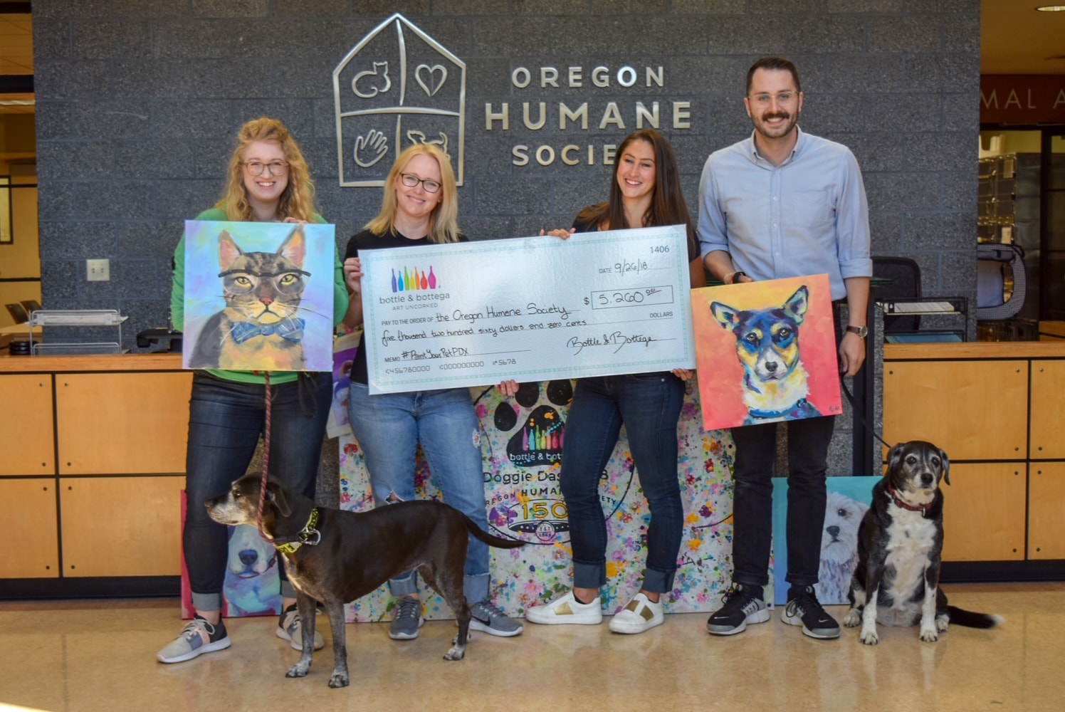 Bottle & Bottega donation check presentation at Oregon Humane Society